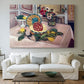 Canvas art print detailing a stylized composition centered on pineapple and lemons, centered above a sofa as a large focal wall piece
