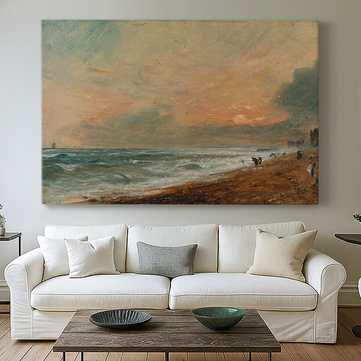 Canvas art print detailing a natural beach landscape with soft movement, centered above a sofa as a large focal wall piece