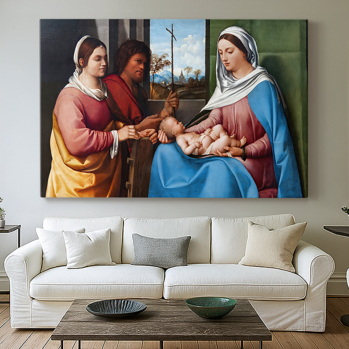 Canvas art print detailing a classical scene with people posed in harmonious outdoor setting, centered above a sofa as a large focal wall piece