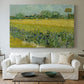 Canvas art print detailing a stylized composition emphasizing color and pattern, centered above a sofa as a large focal wall piece