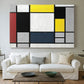Canvas art print detailing a modernist structure, centered above a sofa as a large focal wall piece