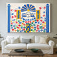Canvas art print detailing a decorative artwork with geometric motifs and vibrant colors, centered above a sofa as a large focal wall piece
