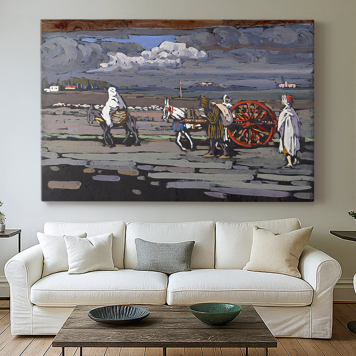 Canvas art print detailing a stylized rural setting with strong color contrasts, centered above a sofa as a large focal wall piece