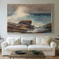 Canvas art print detailing a shoreline view with surf and coastal elements, centered above a sofa as a large focal wall piece