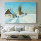 Canvas art print detailing a rural home setting with snow-covered ground and activity, centered above a sofa as a large focal wall piece