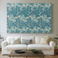 Canvas art print detailing a repeating motif featuring tulips and organic forms, centered above a sofa as a large focal wall piece