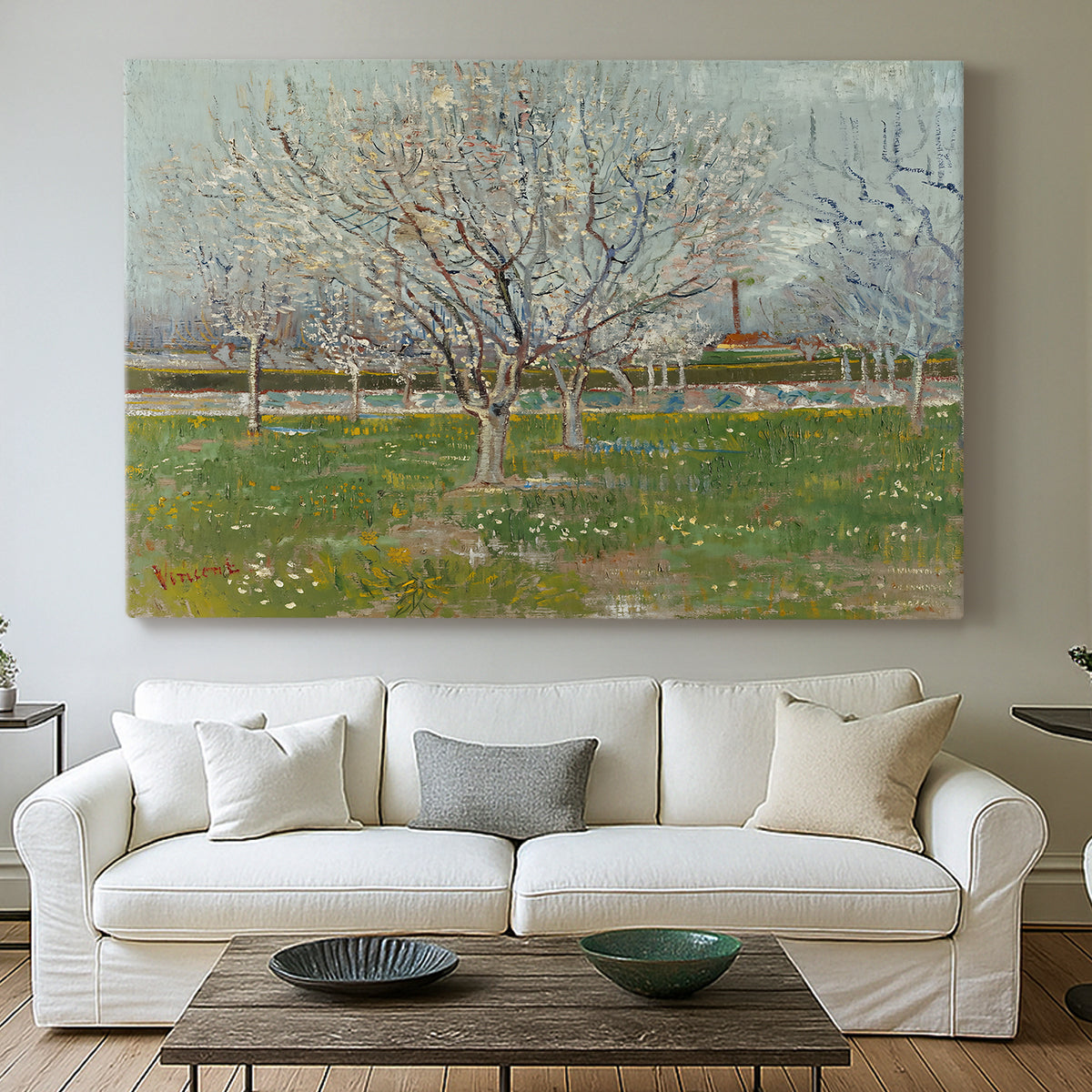 Canvas art print detailing a landscape emphasizing pattern of trees across field, centered above a sofa as a large focal wall piece