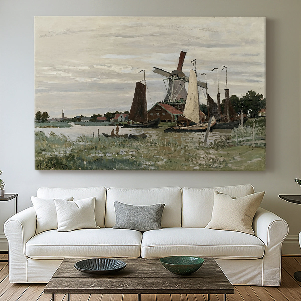 Canvas art print detailing a countryside structure standing against open sky, centered above a sofa as a large focal wall piece
