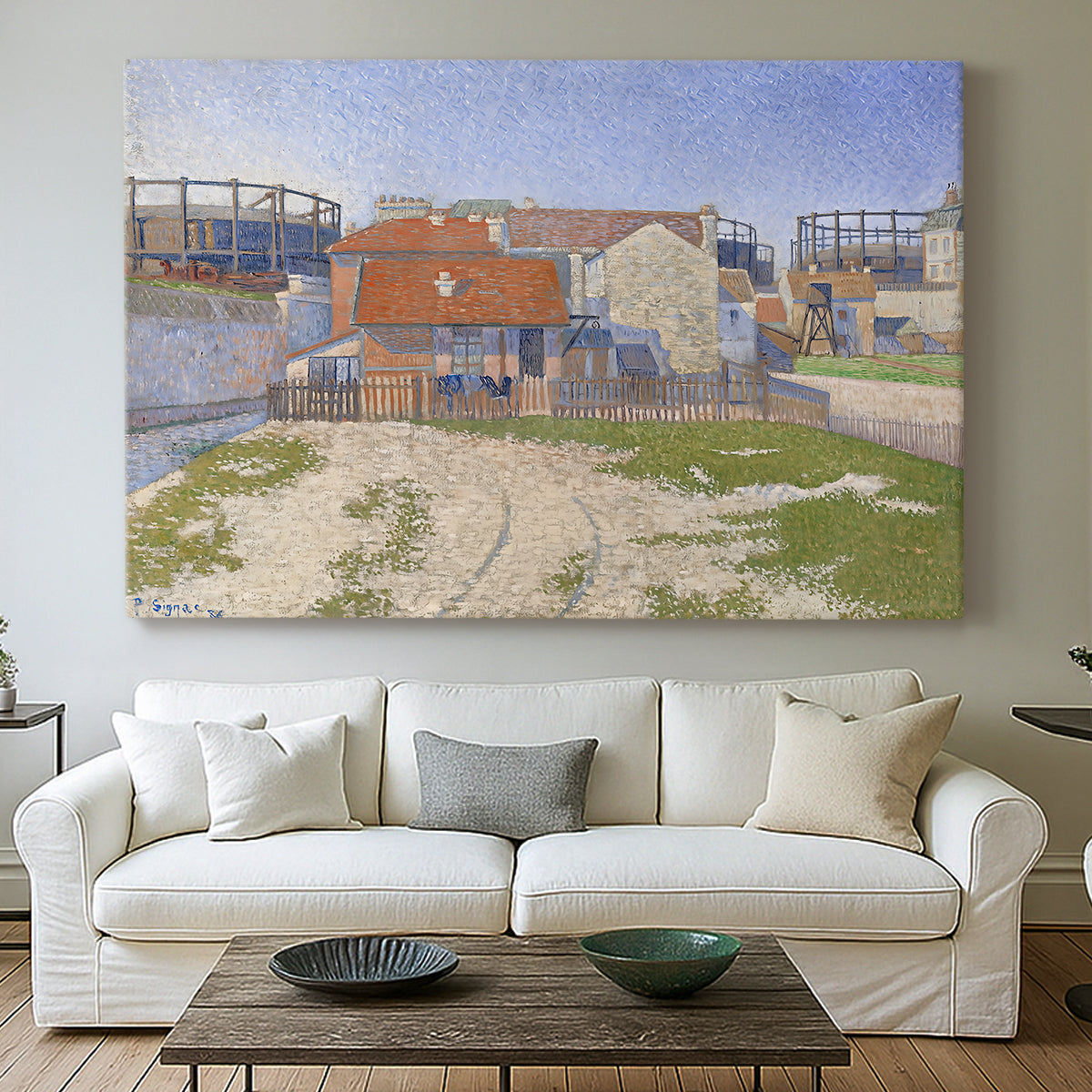 Canvas art print detailing an urban composition with structures, centered above a sofa as a large focal wall piece