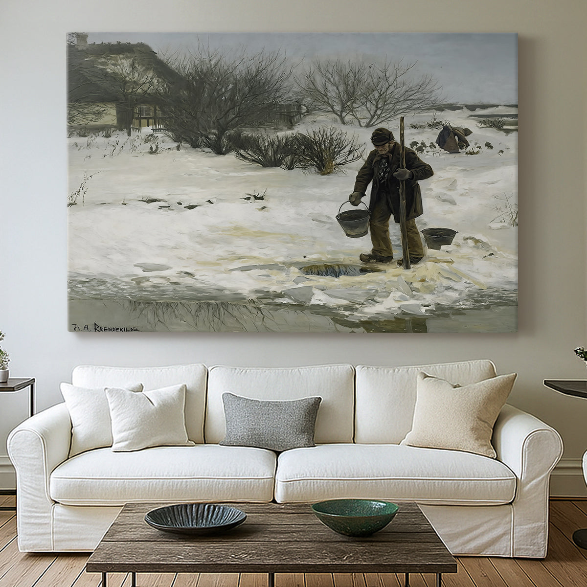 Canvas art print detailing an atmospheric winter landscape with human presence, centered above a sofa as a large focal wall piece