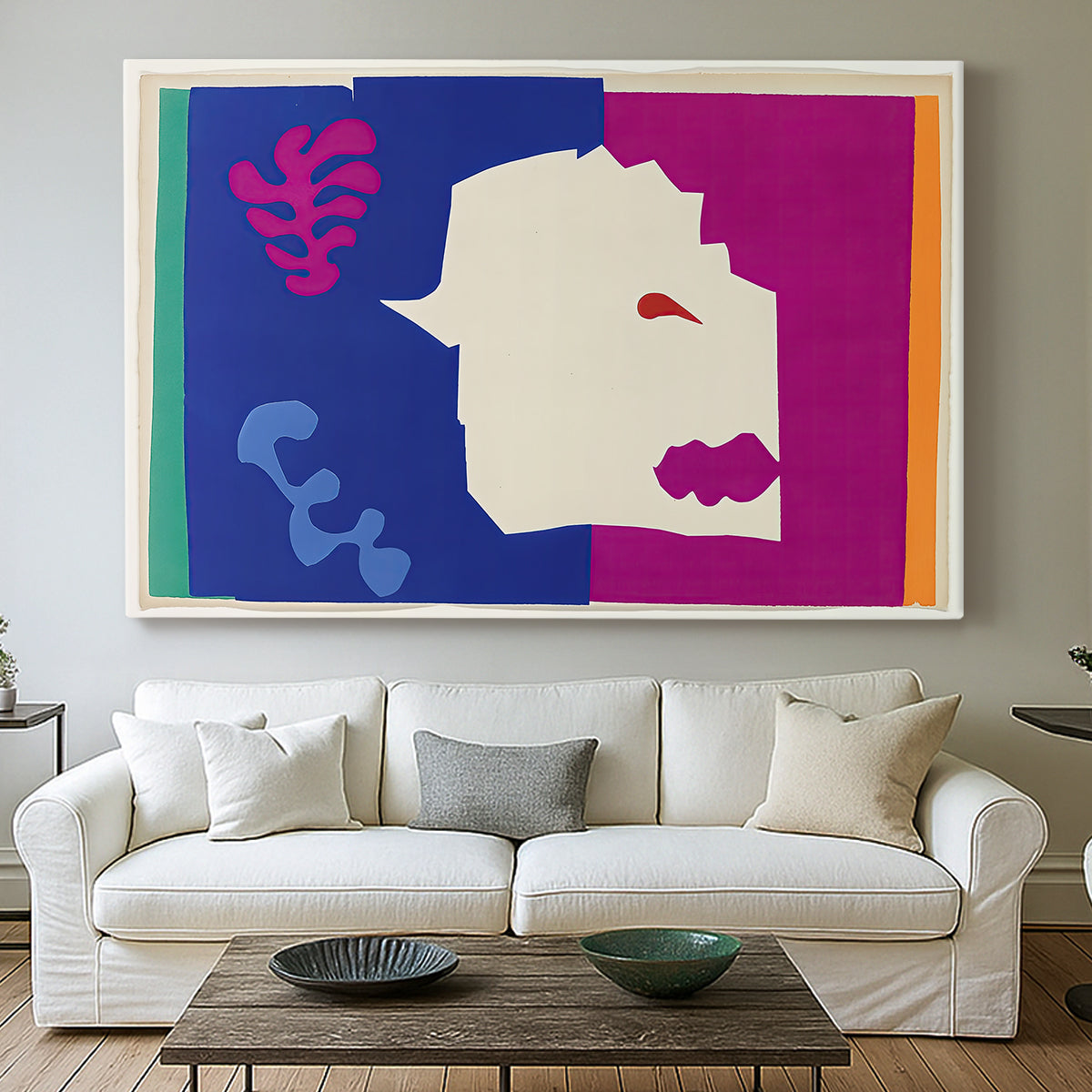 Canvas art print detailing a symbolic cut-out animal design, centered above a sofa as a large focal wall piece