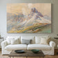 Canvas art print detailing a realistic mountain view with strong geological forms, centered above a sofa as a large focal wall piece
