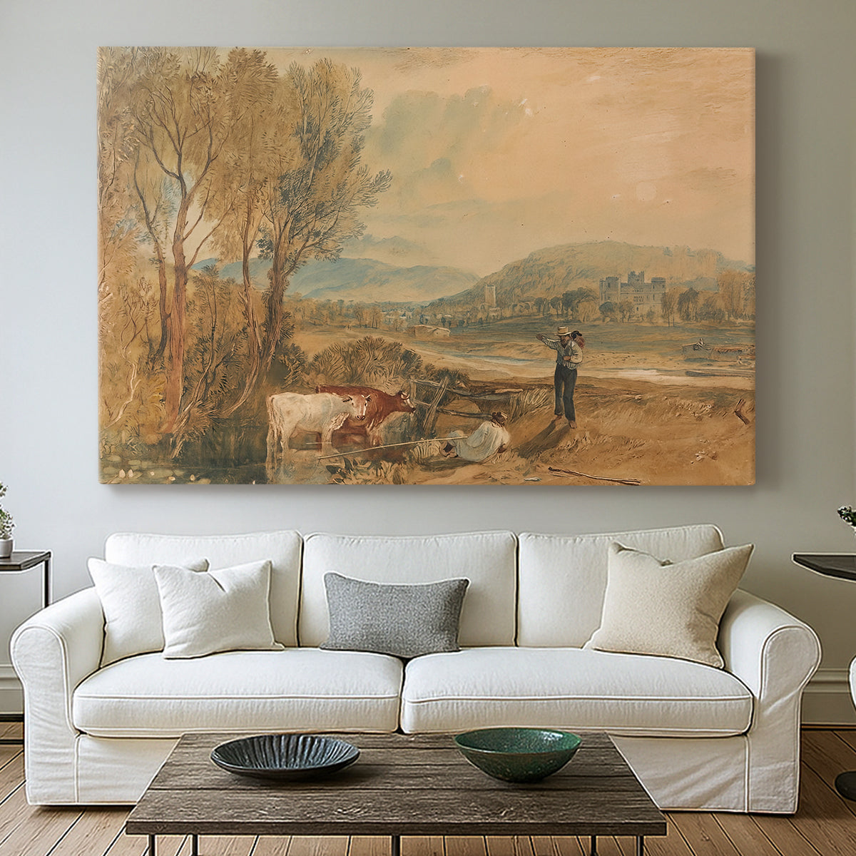 Canvas art print detailing a landscape featuring castle, centered above a sofa as a large focal wall piece
