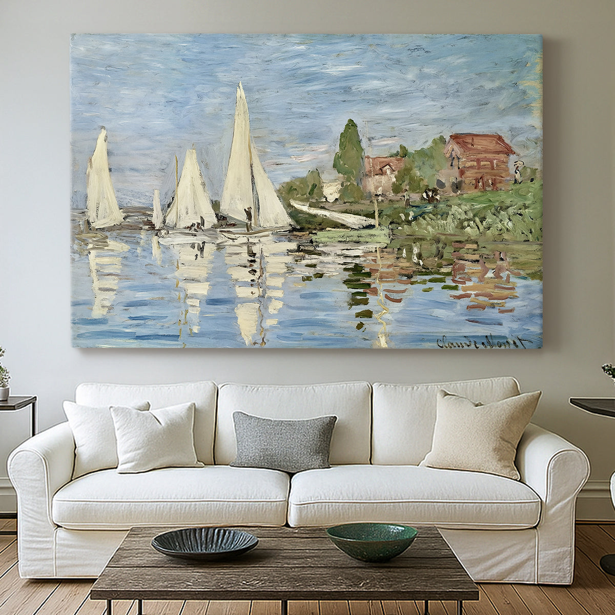Canvas art print detailing a dynamic nautical scene with boats moving across river, centered above a sofa as a large focal wall piece