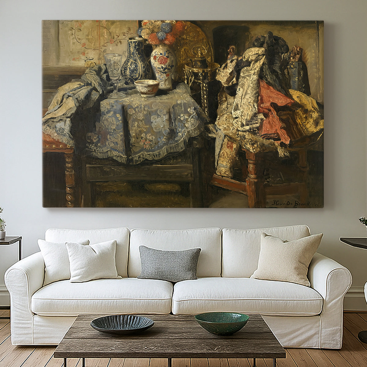Canvas art print detailing a tabletop arrangement highlighting everyday materials, centered above a sofa as a large focal wall piece