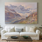 Canvas art print detailing an expansive alpine view with ice and distant mountains, centered above a sofa as a large focal wall piece