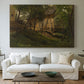 Canvas art print detailing a rural composition with buildings nestled among greenery, centered above a sofa as a large focal wall piece