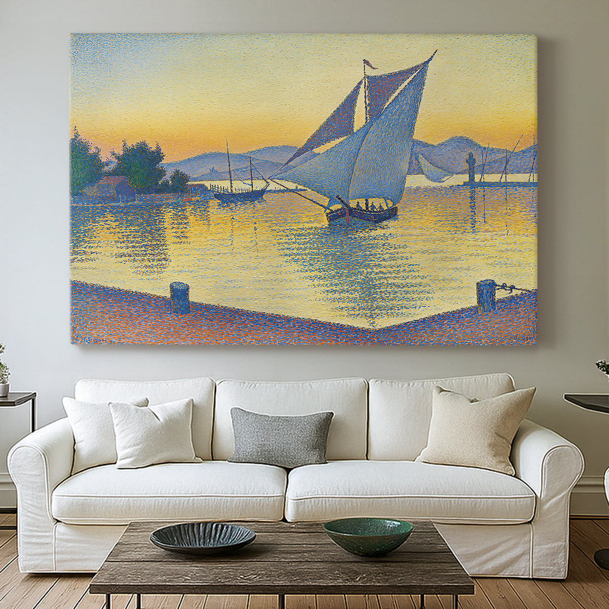 Canvas art print detailing a maritime light scene, centered above a sofa as a large focal wall piece