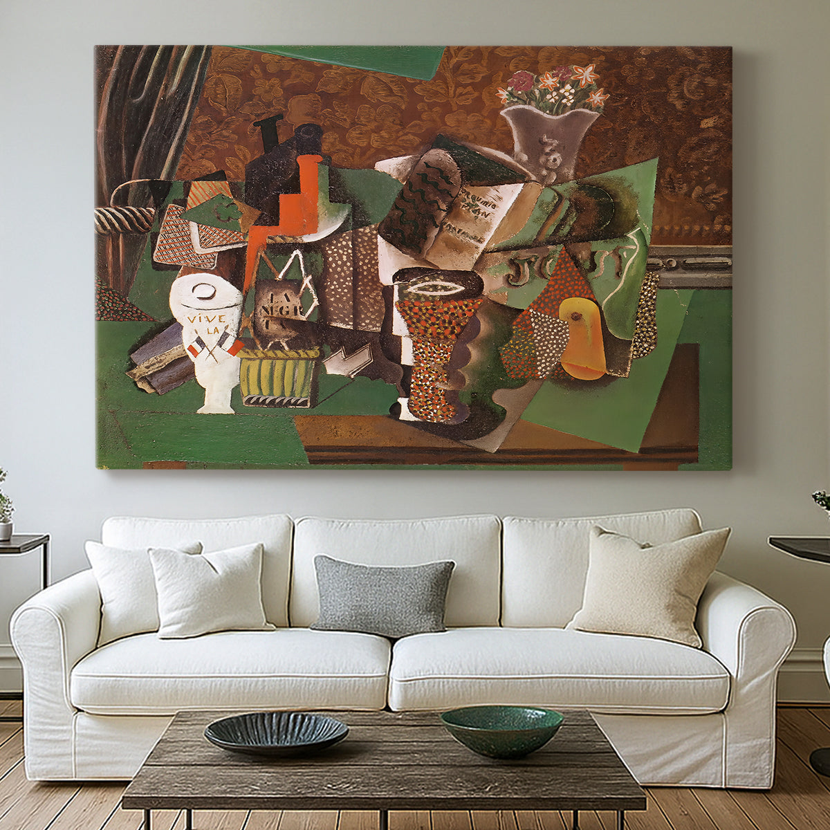 Canvas art print detailing an expressive collage of objects, centered above a sofa as a large focal wall piece