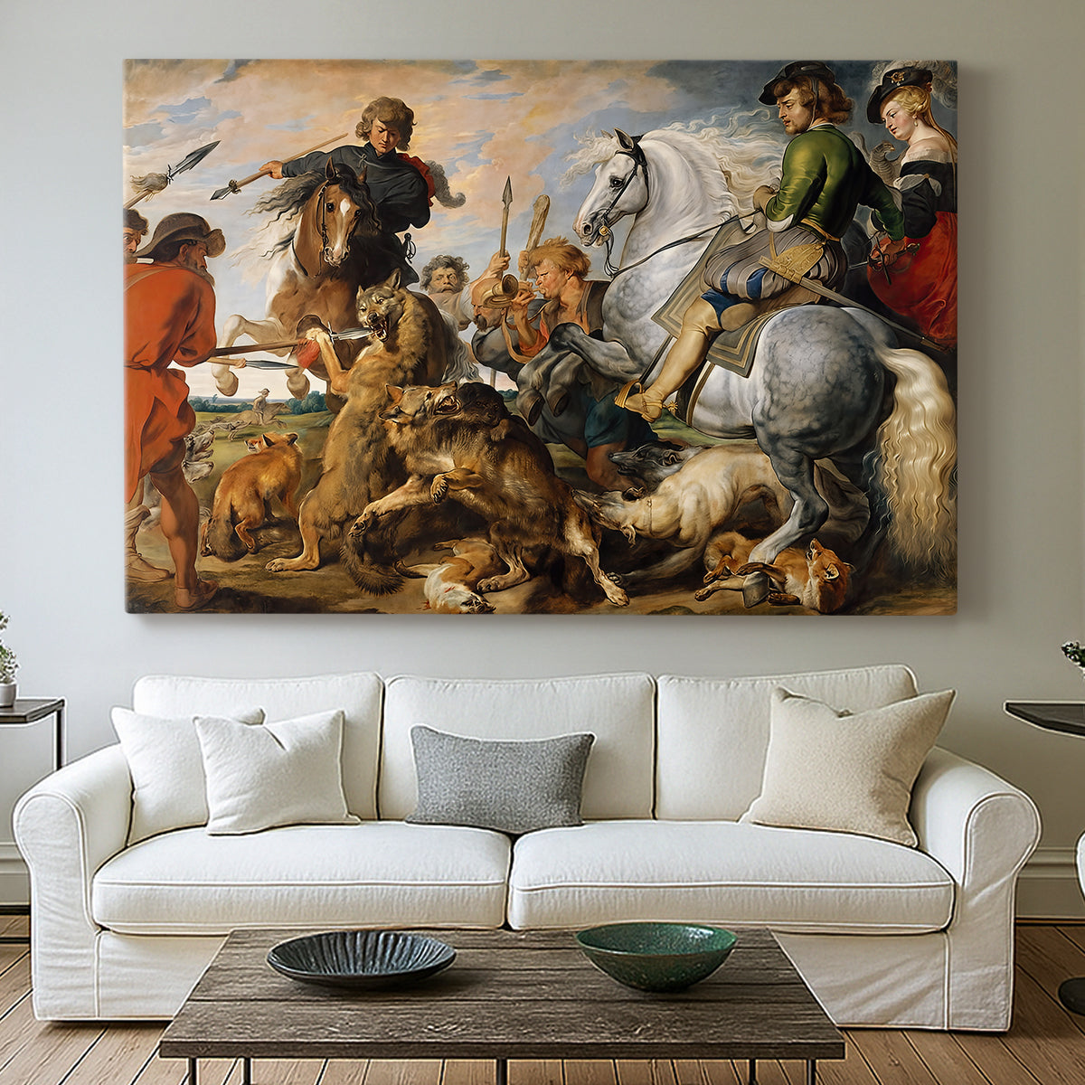 Canvas art print detailing a dramatic outdoor hunt with movement and conflict, centered above a sofa as a large focal wall piece