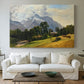 Canvas art print detailing a scenic alpine view with open sky, centered above a sofa as a large focal wall piece