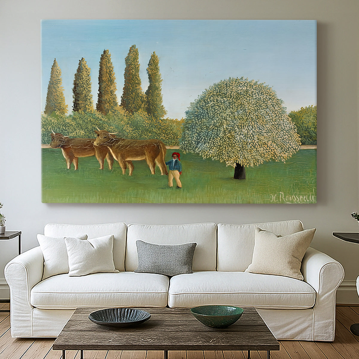 Canvas art print detailing a stylized rural setting with grassland and trees, centered above a sofa as a large focal wall piece