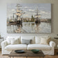 Canvas art print detailing a nautical landscape with vessels resting on calm water, centered above a sofa as a large focal wall piece