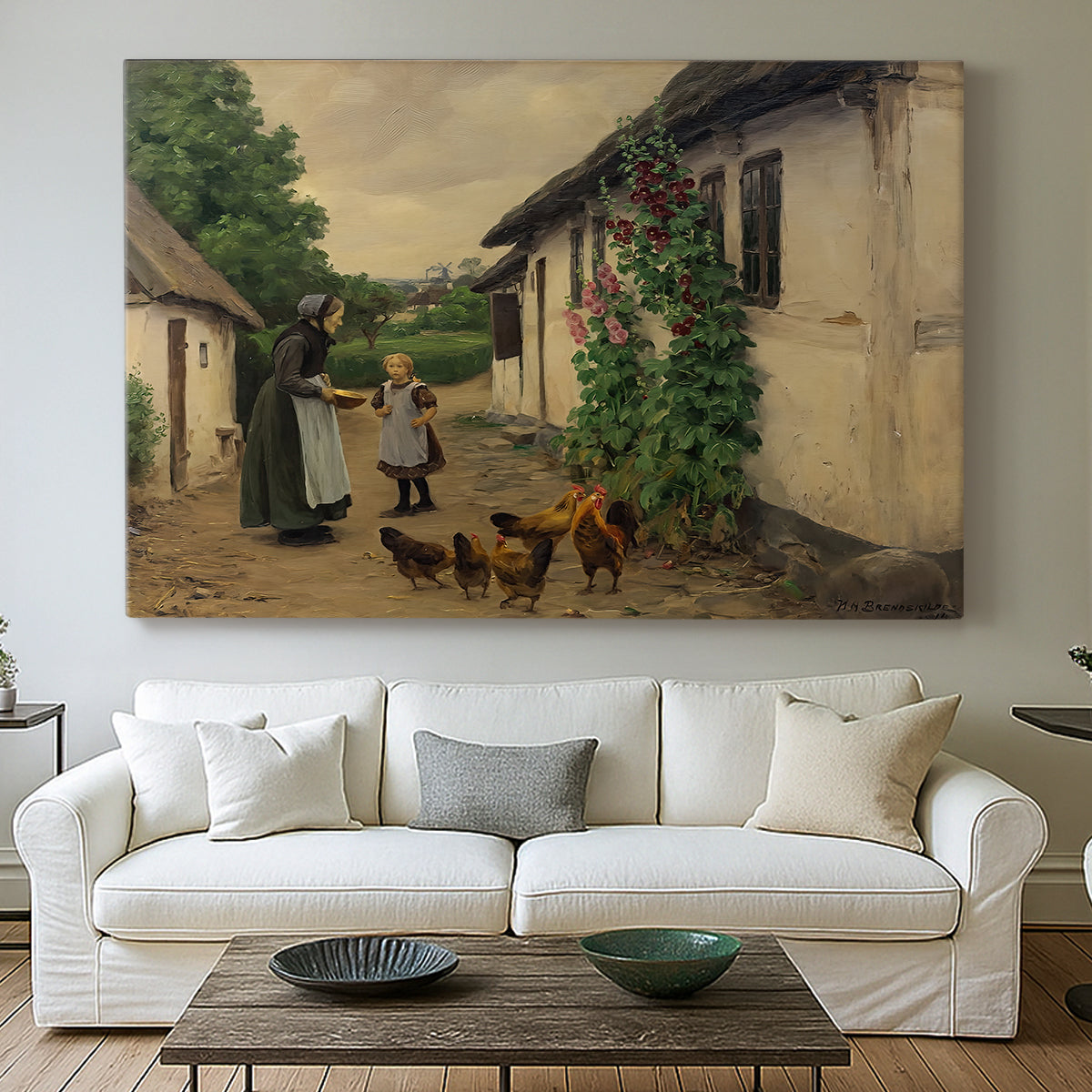 Canvas art print detailing a countryside visit scene with figures in front of rustic buildings, centered above a sofa as a large focal wall piece