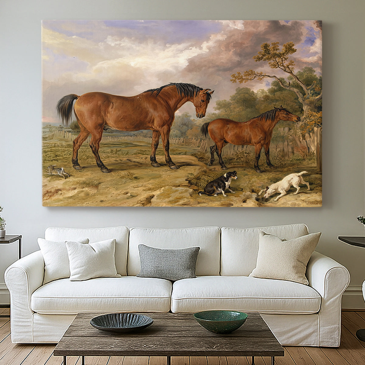 Canvas art print detailing a countryside scene featuring grouped horses, centered above a sofa as a large focal wall piece