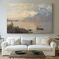 Canvas art print detailing a serene natural setting with water and mountainous backdrop, centered above a sofa as a large focal wall piece
