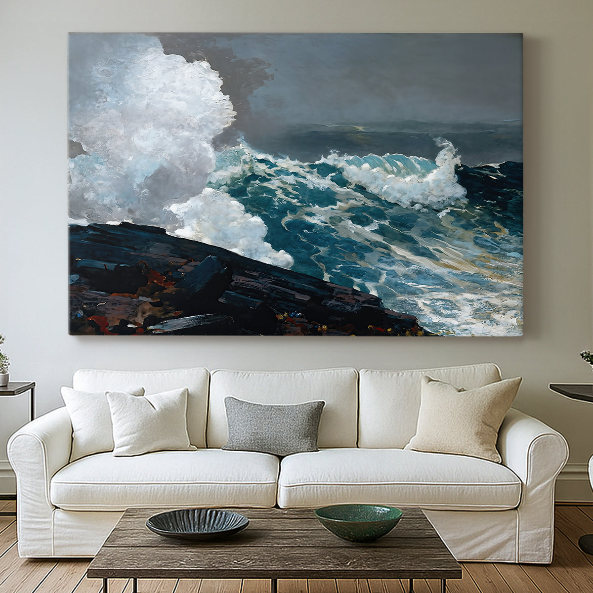 Canvas art print detailing a storm-driven seascape with dark clouds and rough surf, centered above a sofa as a large focal wall piece