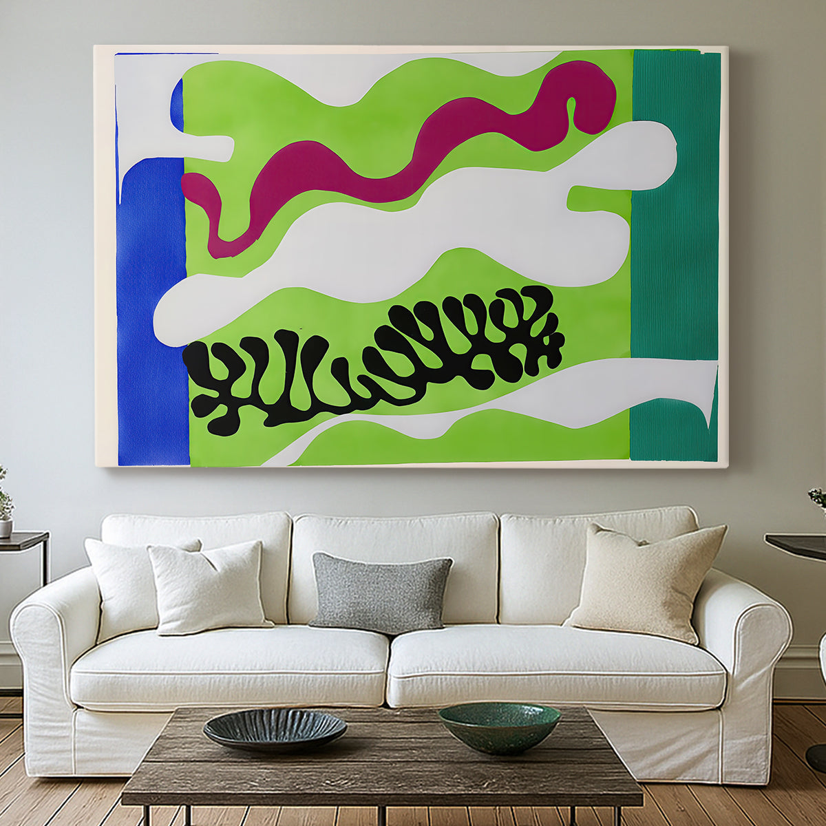 Canvas art print detailing a stylized cut-out design evoking water, centered above a sofa as a large focal wall piece
