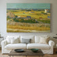 Canvas art print detailing a post-impressionist composition emphasizing seasonal work, centered above a sofa as a large focal wall piece