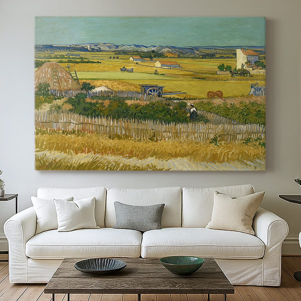 Canvas art print detailing a post-impressionist composition emphasizing seasonal work, centered above a sofa as a large focal wall piece