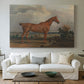 Canvas art print detailing a countryside composition with horse and rider, centered above a sofa as a large focal wall piece