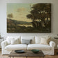 Canvas art print detailing a tranquil countryside view with soft atmospheric tones, centered above a sofa as a large focal wall piece