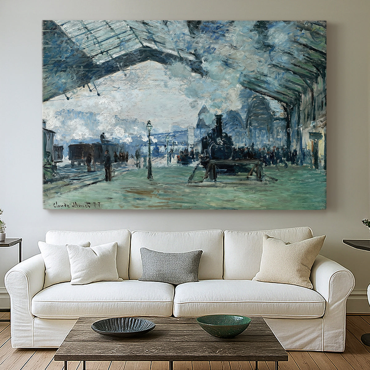 Canvas art print detailing a dramatic depiction of industrial space with trains and light, centered above a sofa as a large focal wall piece