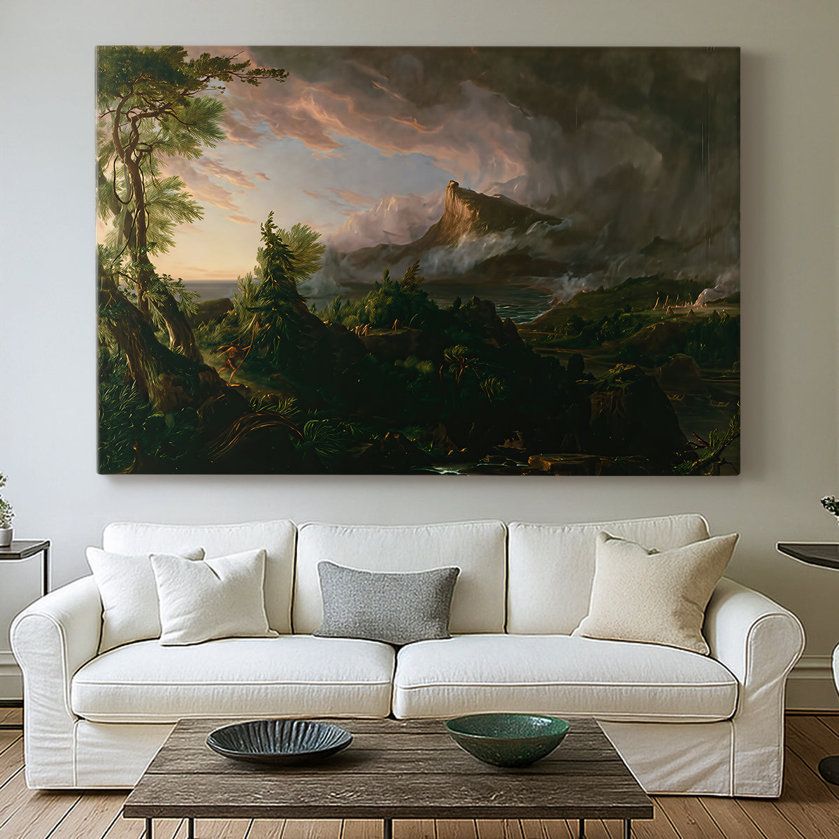 Canvas art print detailing a depiction of nature-dominated world before development, centered above a sofa as a large focal wall piece