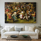 Canvas art print detailing a traditional village wedding scene, centered above a sofa as a large focal wall piece