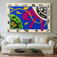 Canvas art print detailing a stylized arrangement of horse and human forms, centered above a sofa as a large focal wall piece