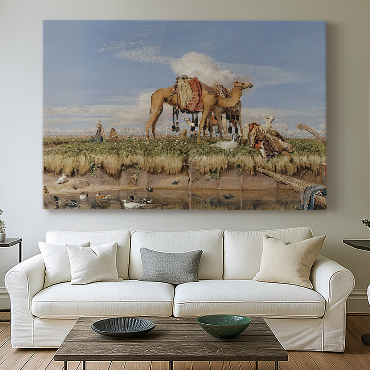 Canvas art print detailing an atmospheric Nile view with figures and shoreline, centered above a sofa as a large focal wall piece
