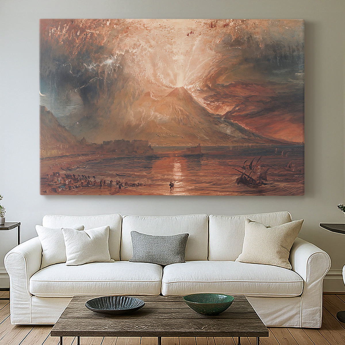 Canvas art print detailing a landscape showing volcanic activity, centered above a sofa as a large focal wall piece