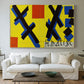 Canvas art print detailing a graphic artwork featuring abstract forms and design elements, centered above a sofa as a large focal wall piece