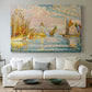 Canvas art print detailing a maritime structure and ships, centered above a sofa as a large focal wall piece