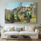 Canvas art print detailing an open terrain scene with trees and atmospheric depth, centered above a sofa as a large focal wall piece