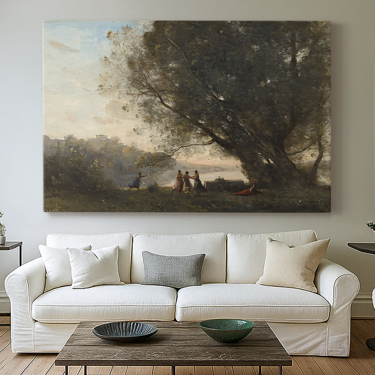 Canvas art print detailing a tranquil outdoor composition with dancing figures and lake, centered above a sofa as a large focal wall piece