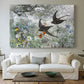 Canvas art print detailing an impressionist wildlife scene capturing birds in motion, centered above a sofa as a large focal wall piece