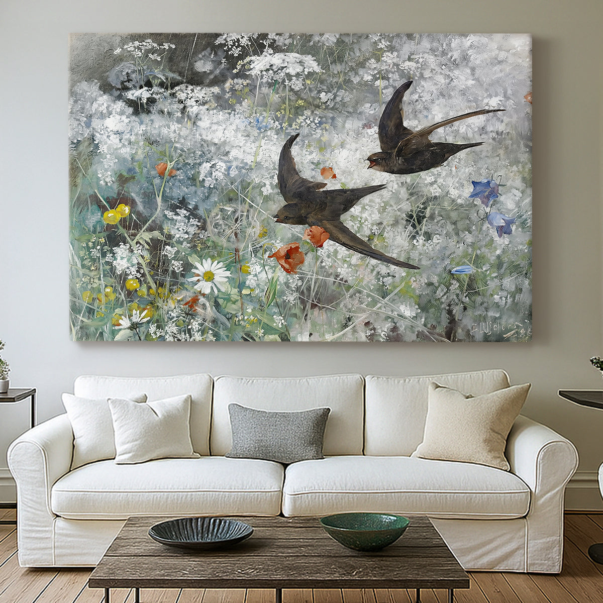 Canvas art print detailing an impressionist wildlife scene capturing birds in motion, centered above a sofa as a large focal wall piece