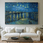 Canvas art print detailing a stylized night composition with river and celestial elements, centered above a sofa as a large focal wall piece