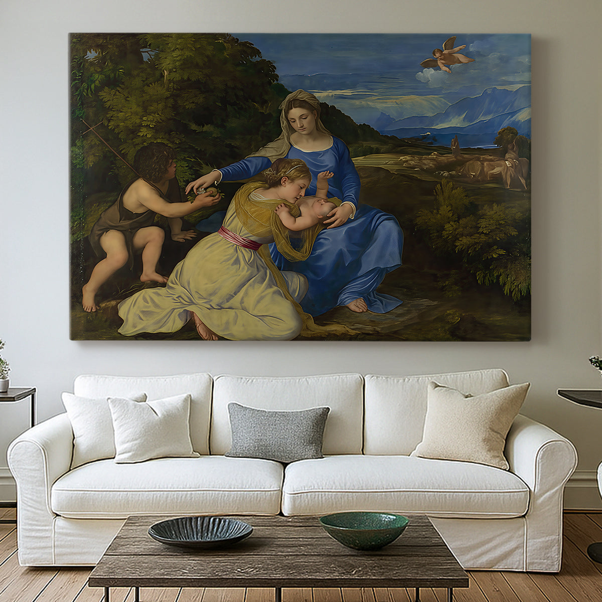 Canvas art print detailing a sacred image of Madonna and child against serene landscape backdrop, centered above a sofa as a large focal wall piece